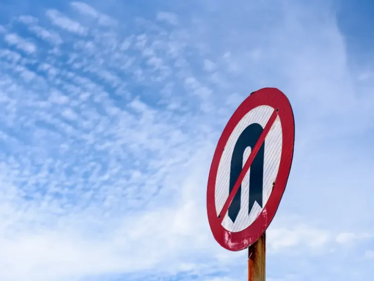 A crossed out u-turn sign.