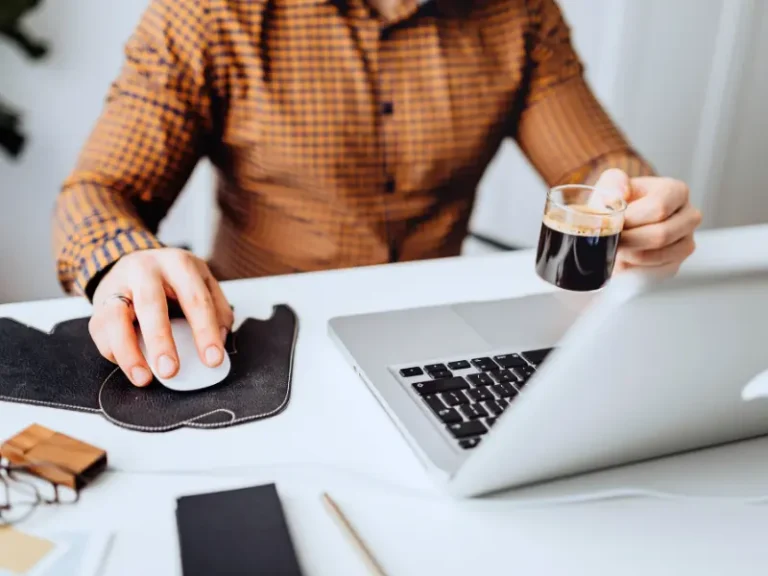 A person is working at their desk.