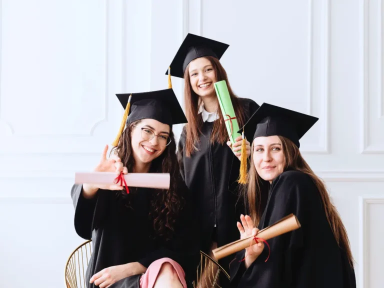 A group of women celebrating their university degree